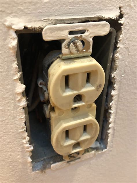 fixing an outlet hole